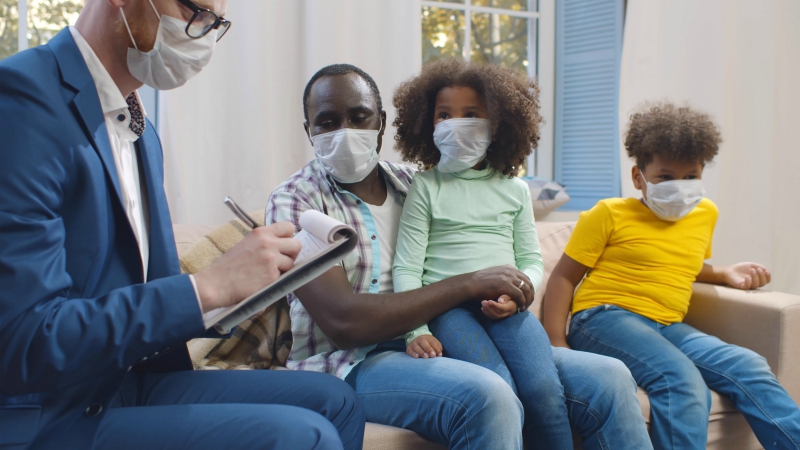 family sitting together answering survey