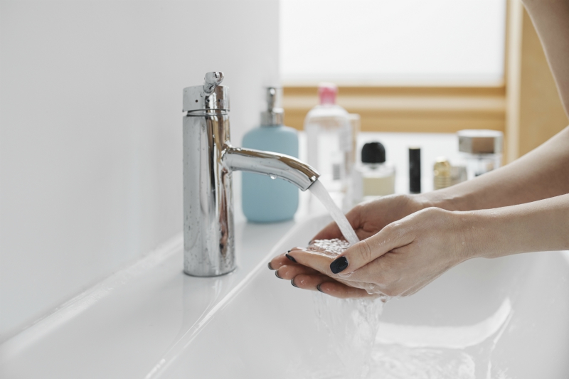 person washing hands