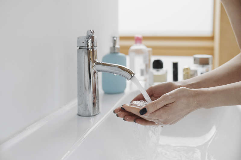 person washing hands