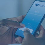 two hands signing in to the UEI financial app